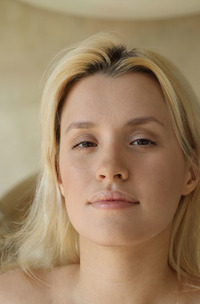 Angel Jolie Lets Her Daisy-print Sundress Slip To The Floor And Reclines On Some Cushions