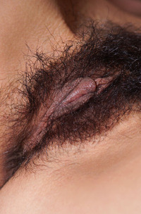 Rezza Reclining On The Sofa With Alluring Grace