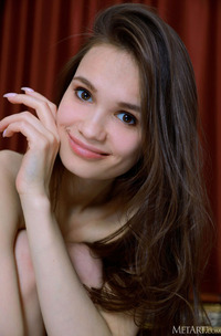 Anastasia Bella Bending Over It For An Intimate Rear View