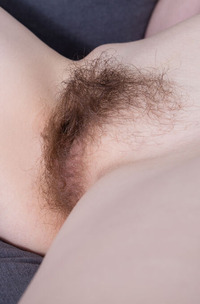 Enid The Uninhibited Natural Beauty Spreads Her Pale Thighs For An Intimate View