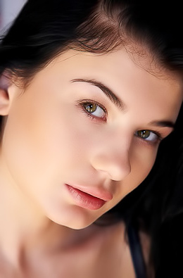 Busty Lucy Li Takes Off Her Leather Dress