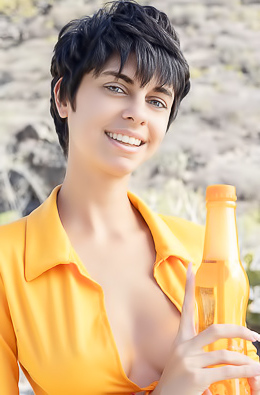 Kensi Dressed In A Bold Orange Crop Top That Hugs Her Perfect Breasts And A Matching Mini Skirt