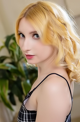 Minnie Lighter Squeezing Her Gorgeous Breasts And Smiles Seductively