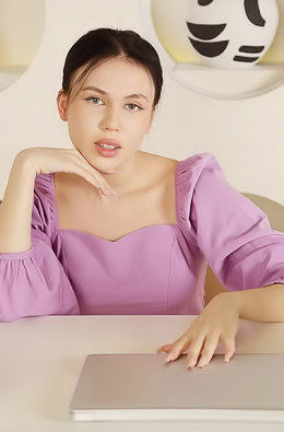 Kris Si Entices In Panties While Displaying Perky Nipples And Agile Feet On A Chair Indoors