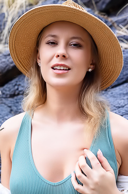 Casey Jones Teases Outdoors With Long Hair And Wide Spread Legs In A Sexy Striptease