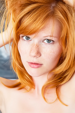 Adorable freckle-faced redhead Mia Sollis
